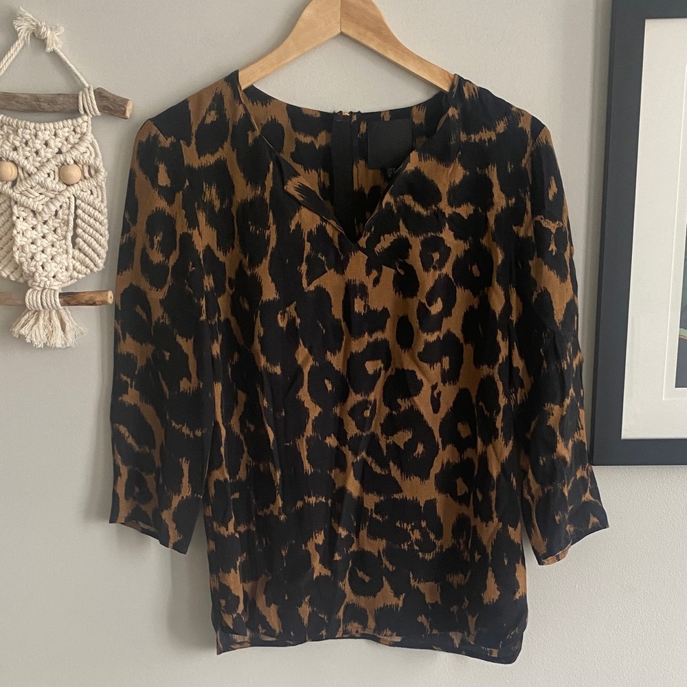 [8] Animal Print Zip Back Blouse